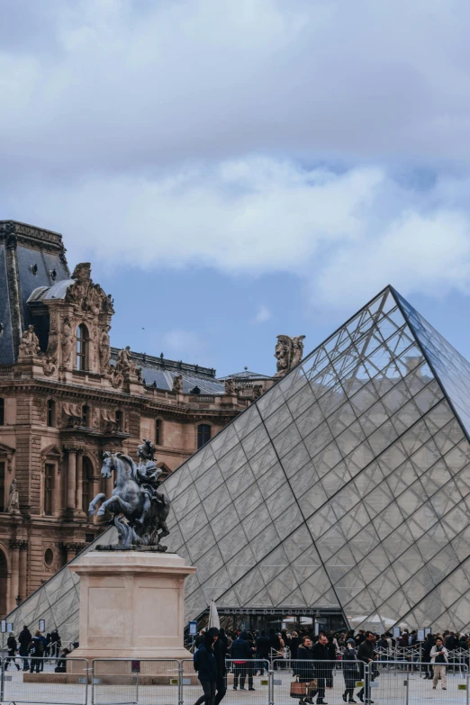 a group of people standing in front of a glass pyramid, a statue, inspired by François Girardon, trending on unsplash, visual art, square, ornate french architecture, superb detail 8 k, slide show