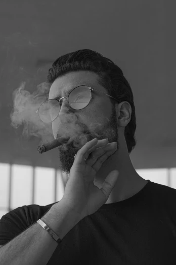 a black and white photo of a man smoking a cigarette, inspired by Sergio Burzi, h3h3, chillhop, smoke :6, gal yosef