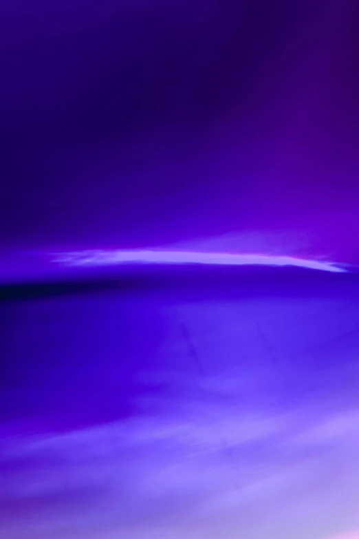 a blurry photo of a purple and blue sky, by Doug Ohlson, lyrical abstraction, made of liquid purple metal, dramatic lighting - n 9, abstract photography, abstract conceptual