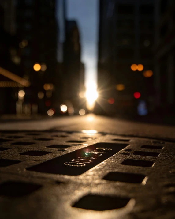 a city street filled with lots of traffic at night, an album cover, by Greg Rutkowski, unsplash contest winner, street art, late afternoon sun, metal plate photograph, light casting onto the ground, today\'s featured photograph 4k