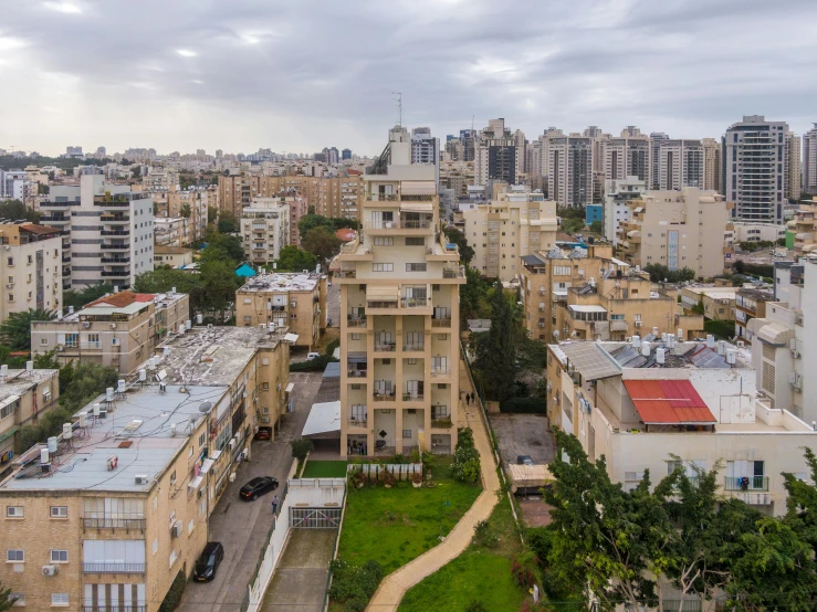 a view of a city from the top of a building, eytan zana, residential area, building facing, exterior shot