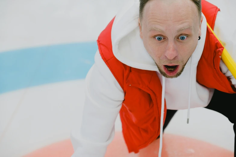 a man standing on top of a curling rink, pexels contest winner, shock art, clear todd solondz face, excited russians, high angle close up shot, avatar image