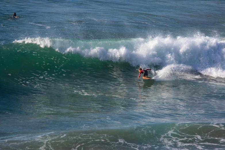 a man riding a wave on top of a surfboard, by Tom Bonson, pexels contest winner, a green, coastal, no cropping, rectangle