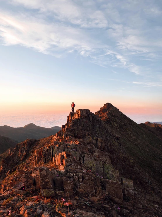 a person standing on top of a mountain, by Lee Loughridge, unsplash contest winner, golden hour 8 k, crib goch!!!!!!!!!!! ridge, new hampshire mountain, profile image