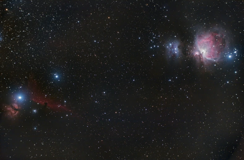 a group of stars that are in the sky, a colorized photo, by Kev Walker, pexels contest winner, space art, reds, panoramic, visible sky and humid atmosphere, astronomical