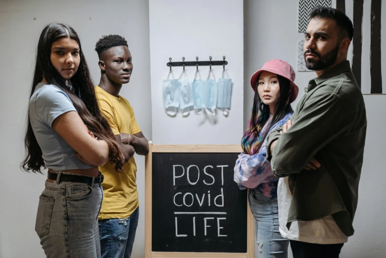 a group of people standing next to a chalk board, a poster, pexels contest winner, covid, postage, college students, profile image