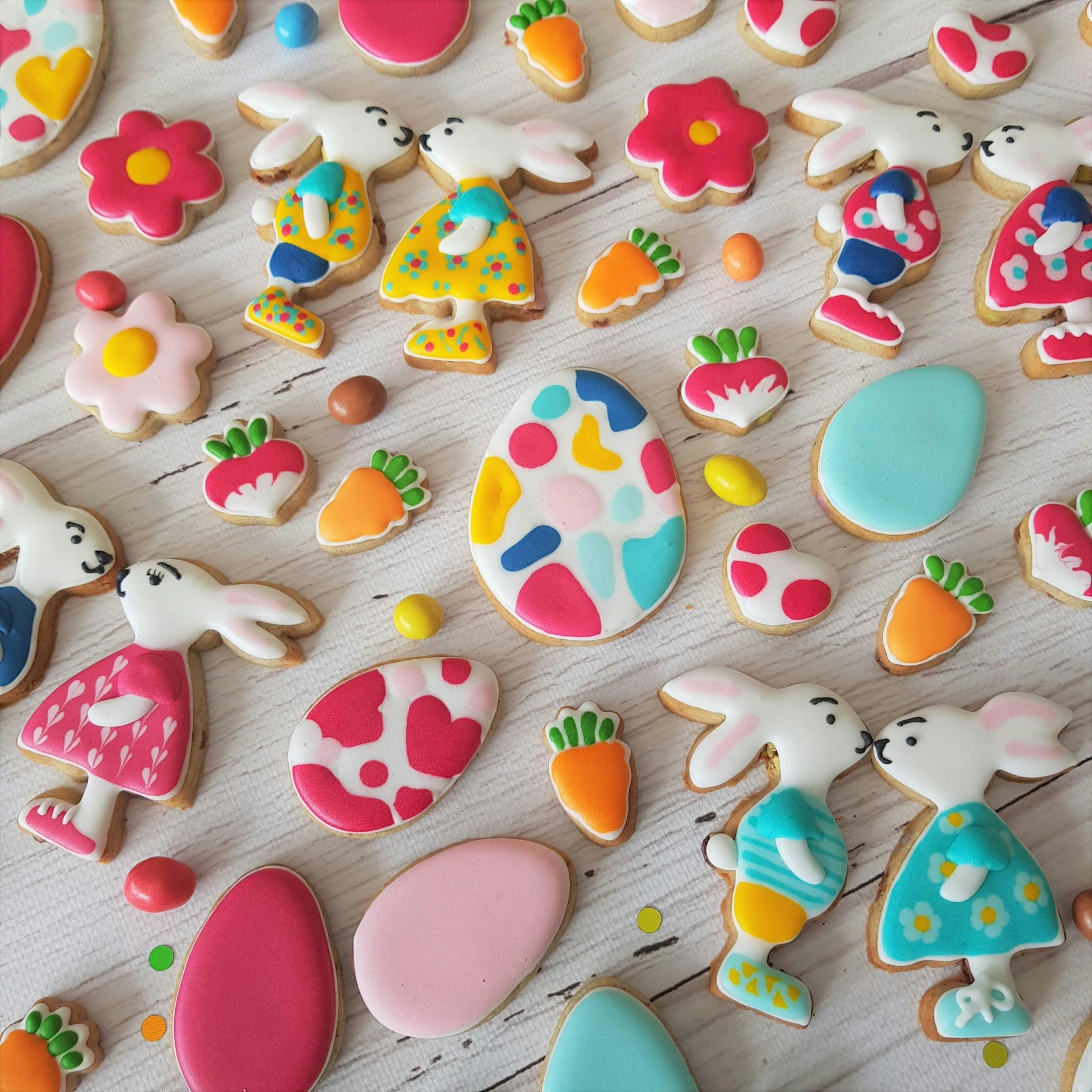 a table topped with lots of decorated cookies, inspired by Annabel Kidston, holding easter eggs, resin coated, thumbnail, spring vibrancy