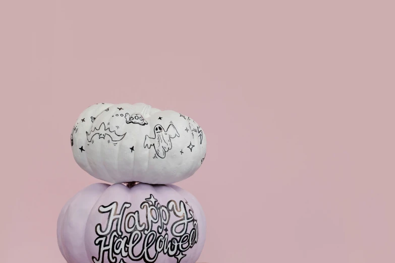 three white pumpkins stacked on top of each other, a pastel, inspired by Peter Alexander Hay, trending on pexels, graffiti, black white pastel pink, background image, halloween theme, emma bridgewater and paperchase