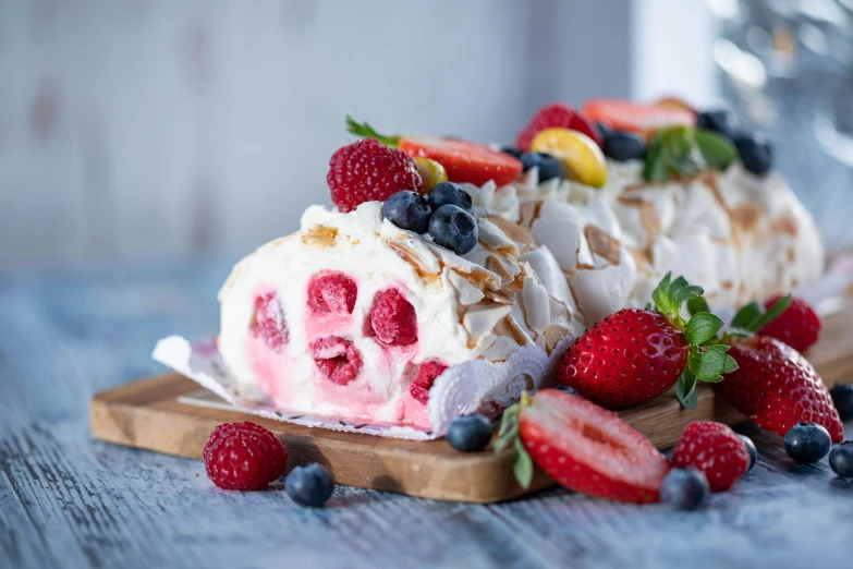 a dessert roll sitting on top of a wooden cutting board, by Alexander Brook, unsplash, sea of parfait, fully decorated, profile image, next to sliced strawberries