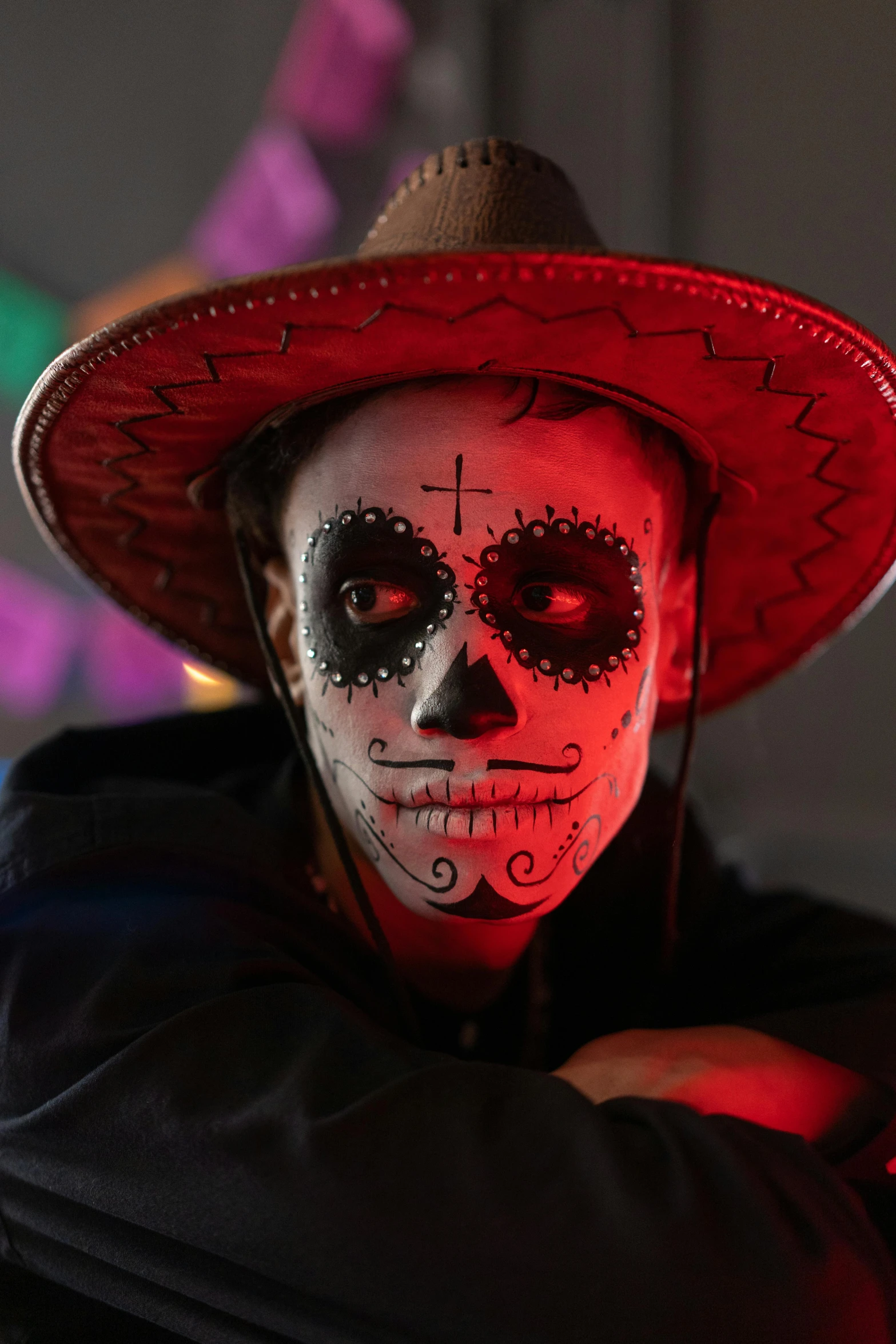 a man in a mexican costume poses for a picture, pexels contest winner, lowbrow, glowing red skull, square, ( ( theatrical ) ), teenage boy