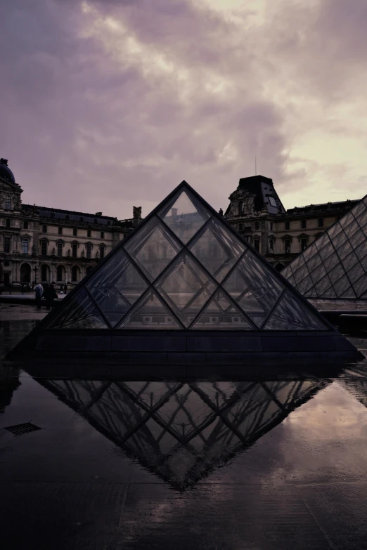 a couple of pyramids sitting next to each other, by Sven Erixson, unsplash contest winner, visual art, parisian buildings, wet reflections in square eyes, les catacombes, purple