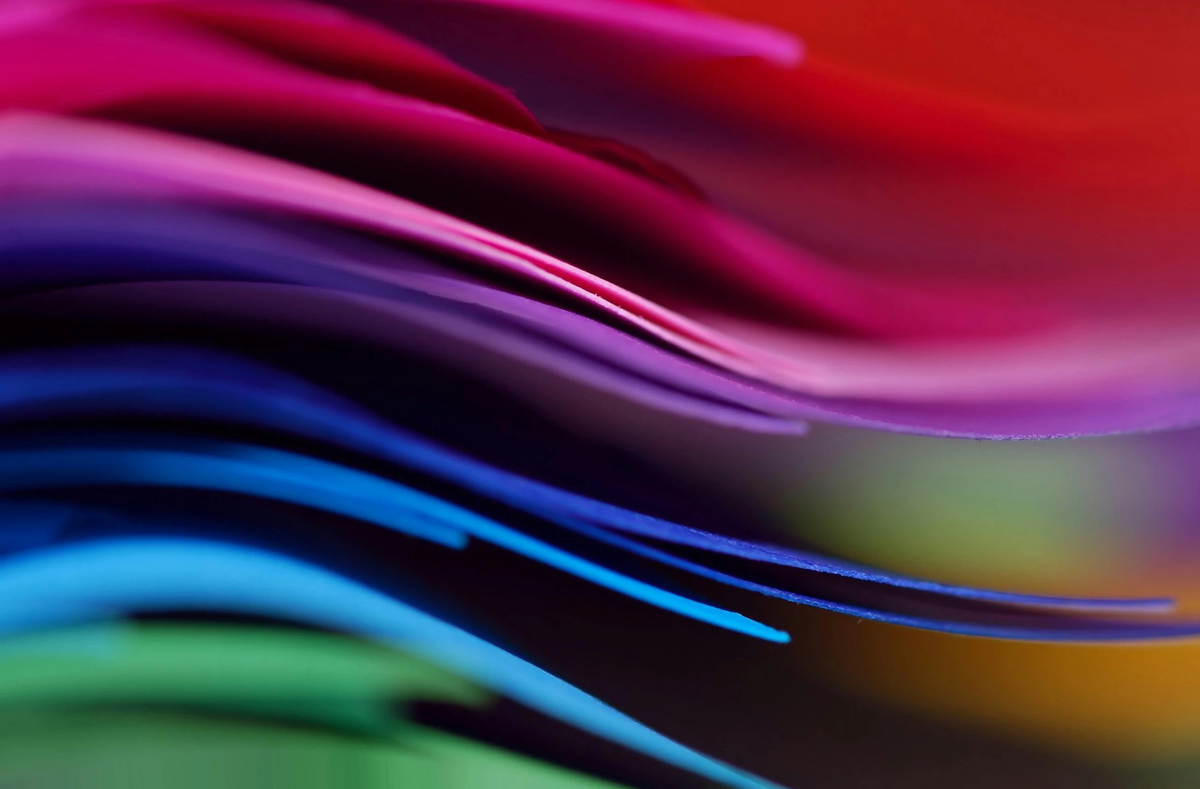 a bunch of colorful papers stacked on top of each other, a macro photograph, by Jan Rustem, unsplash, color light waves, deep colour, soft blur, color ( sony a 7 r iv