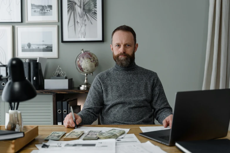 a man sitting at a desk in front of a laptop computer, pexels contest winner, renaissance, carson ellis, large and in charge, chris scalf, high budget