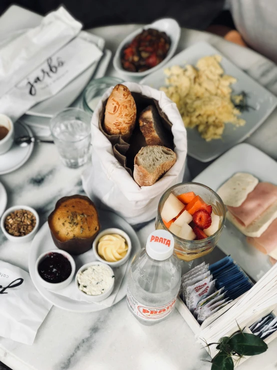 a table that has a bunch of food on it, inspired by Albert Paris Gütersloh, unsplash, happening, breakfast, boka, grey, thumbnail