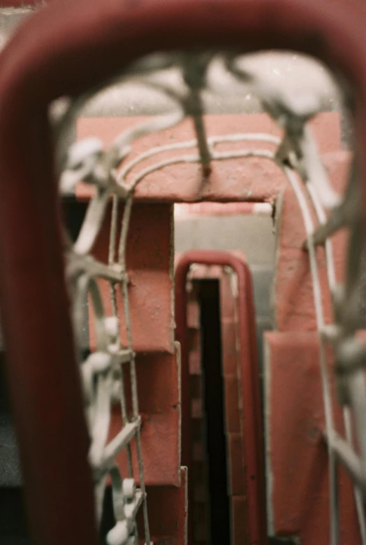 a close up view of the inside of a train car, by Daniel Lieske, pale red, stairways, rope bridge, low quality photo