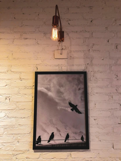 a picture hanging on the wall of a restaurant, poster art, pexels contest winner, holding electricity and birds, ioyful vibe and lighting, low quality photo, black crows flying