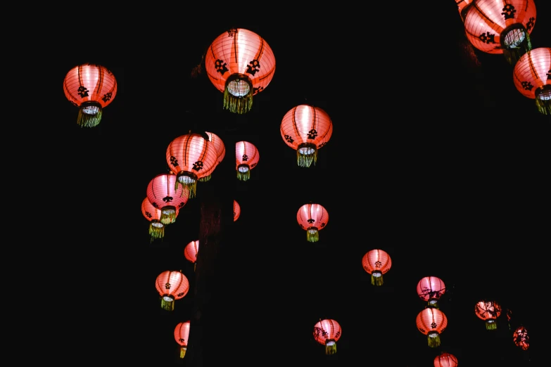 many red lanterns are lit up in the dark, by Emma Andijewska, visual art, pink moon, photography, black, chinese