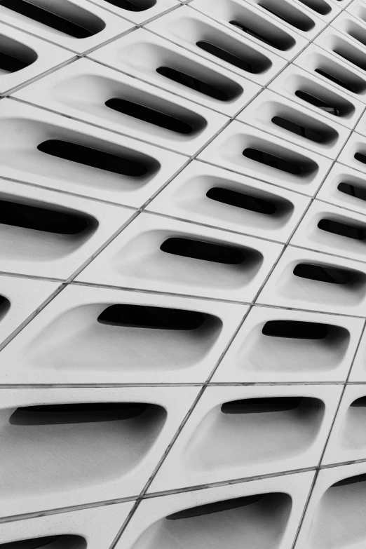 a black and white photo of a building, inspired by Zaha Hadid, unsplash contest winner, white block fence, white ceramic shapes, california;, detiled