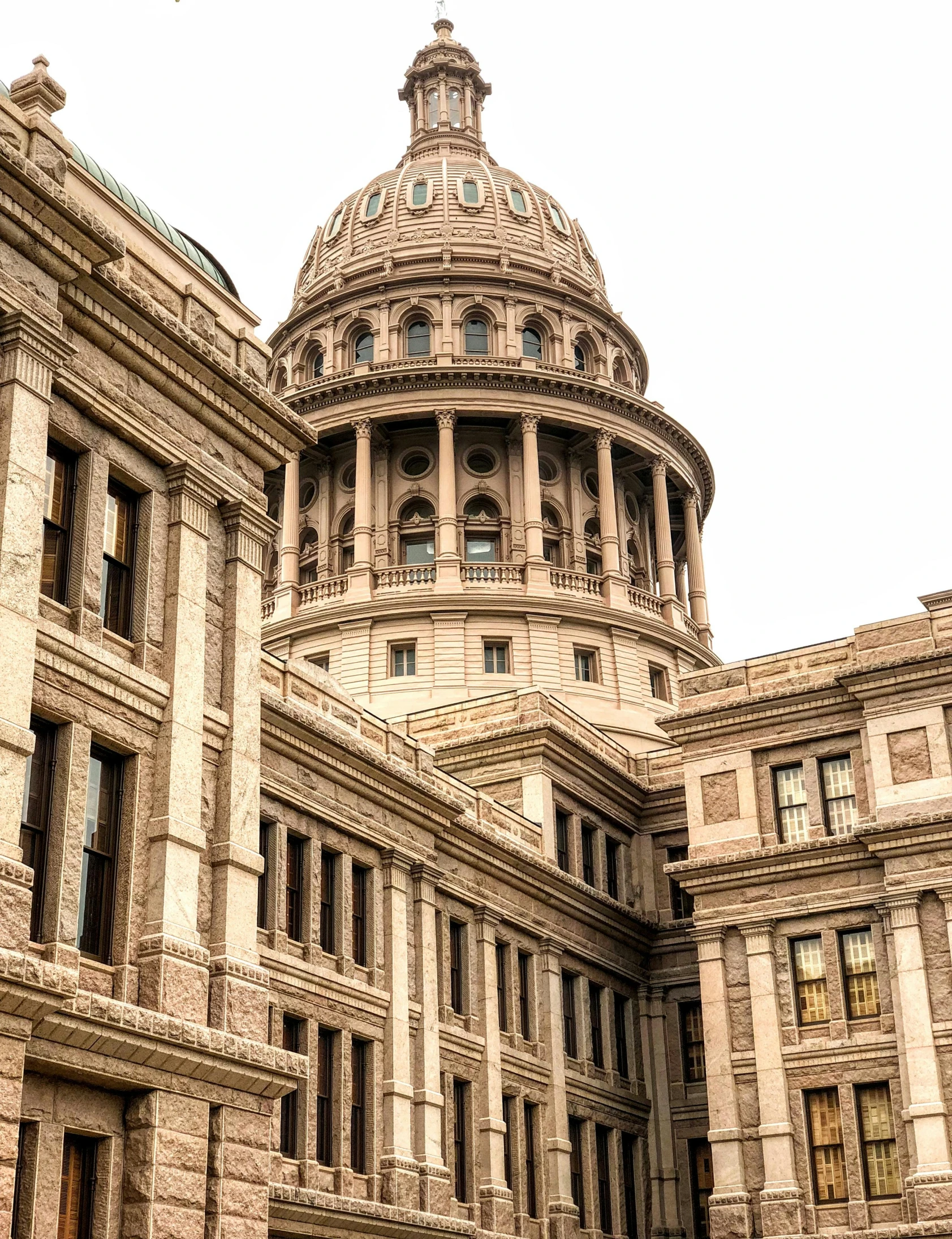 a large building with a clock on top of it, the texas revolution, 🚿🗝📝