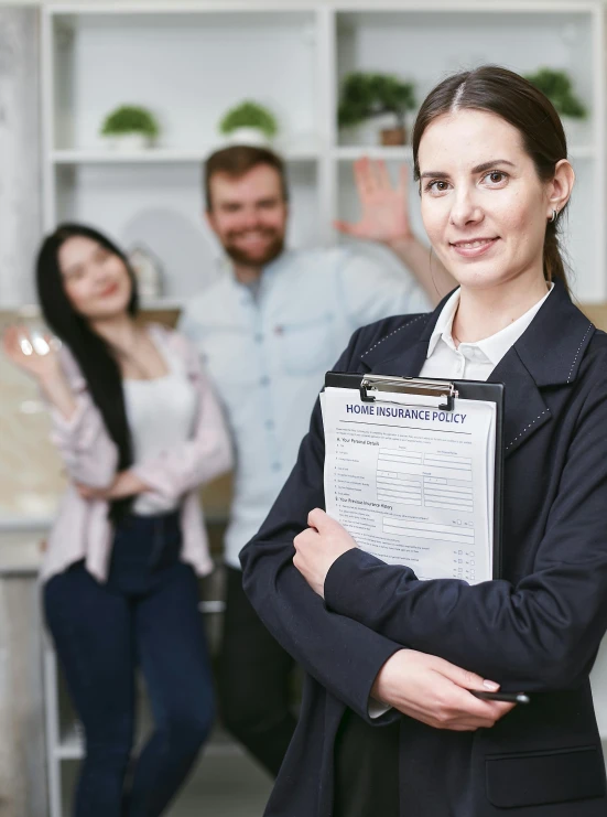 a woman holding a clipboard in front of a group of people, selling insurance, high-quality photo, thumbnail, indoor picture