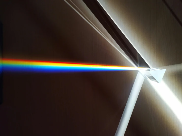 a close up of a light coming through a prism, a hologram, inspired by Gabriel Dawe, pexels contest winner, beeple. hyperrealism, muted rainbow tubing, light coming from the right side, glowing white lasers