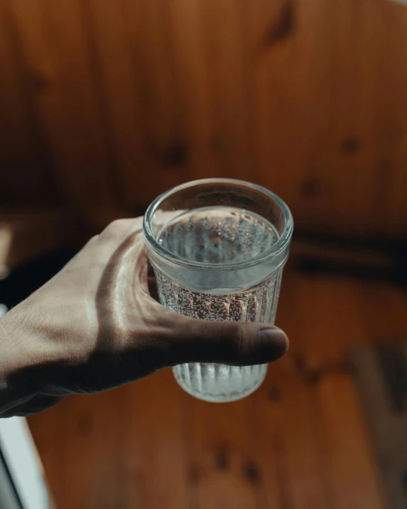 a person holding a glass of water in their hand, pexels contest winner, renaissance, highly detailed # no filter, lgbtq, hungover, highly upvoted