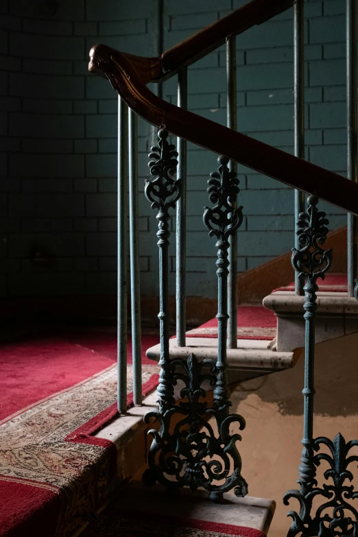 a set of stairs in a building with a red carpet, inspired by Luis Paret y Alcazar, lpoty, well worn, ( ( railings ) ), eclectic