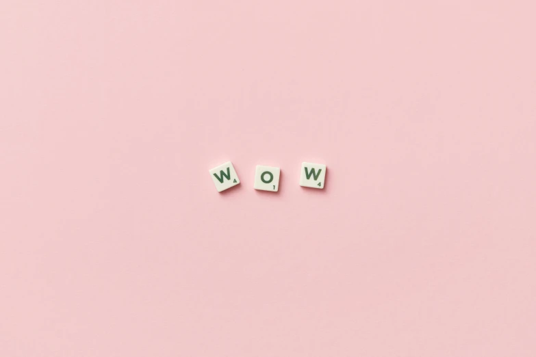 the word wow spelled in wooden letters on a pink background, trending on unsplash, aestheticism, earing a shirt laughing, 🤬 🤮 💕 🎀, angiewolf, wow it is beautiful