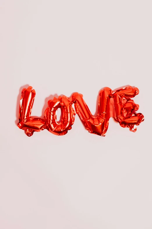 a red balloon with the word love written on it, trending on pexels, foil effect, society 6, pokimane, ilustration