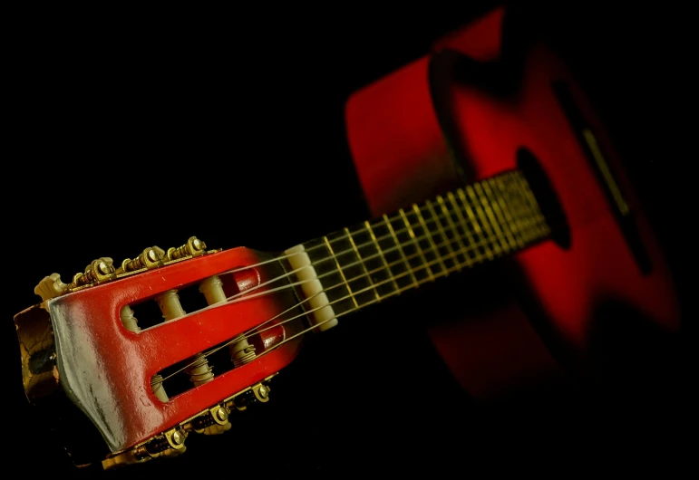 a close up of a red guitar on a black background, by Alejandro Obregón, pexels contest winner, thumbnail, coloured, studio photo, summer evening