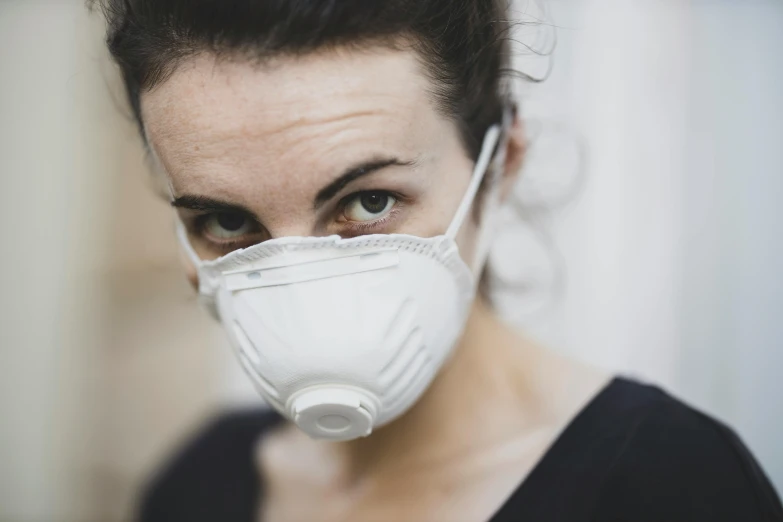 a close up of a person wearing a face mask, pexels contest winner, antipodeans, portrait of a female pathologist, dust mask, serious composure, avatar image