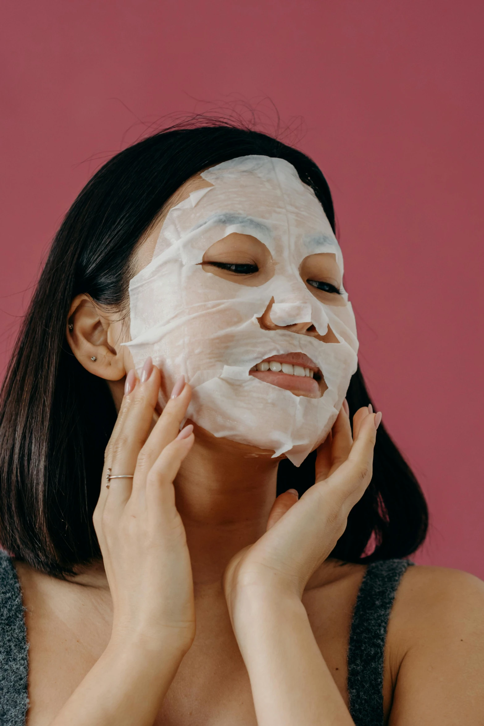 a woman with a sheet mask on her face, trending on pexels, asian hyperdetailed, square face, multi-part, detailed product image