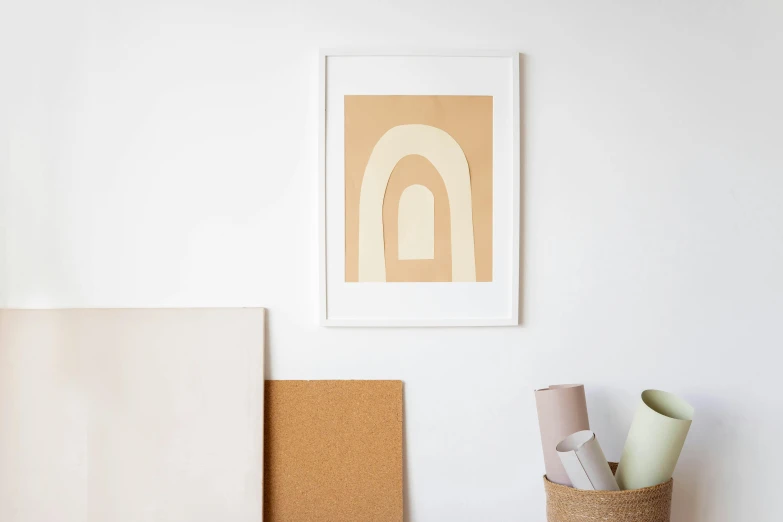 a picture hanging on a wall in a room, a minimalist painting, trending on unsplash, geometric abstract art, arched back, ochre, cream paper, linocut art print