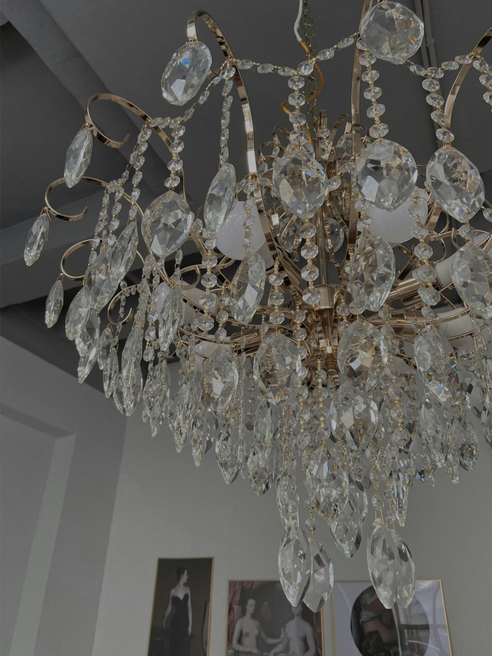 a chandelier hanging from the ceiling in a room, an album cover, by Harry Haenigsen, unsplash, rococo, 2 5 6 x 2 5 6 pixels, detail shot, with clear glass, super realistic