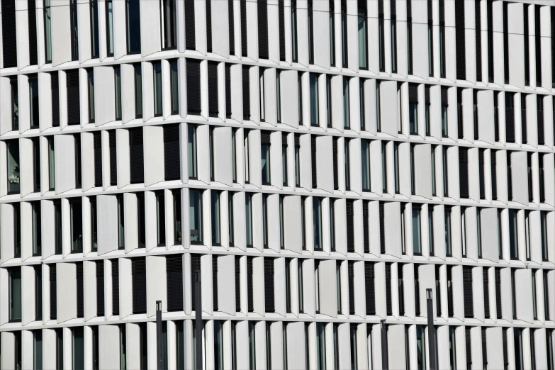 a black and white photo of a tall building, inspired by David Chipperfield, unsplash, aquamarine windows, square lines, medium closeup shot, white steel