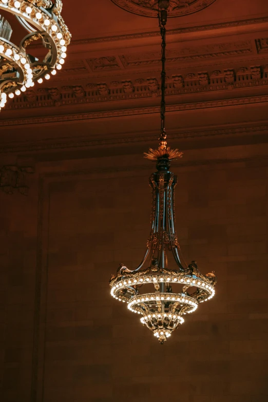 a couple of chandeliers hanging from a ceiling, unsplash, art nouveau, metropolitan museum, evening lighting, 2 5 6 x 2 5 6 pixels, soft lighting |