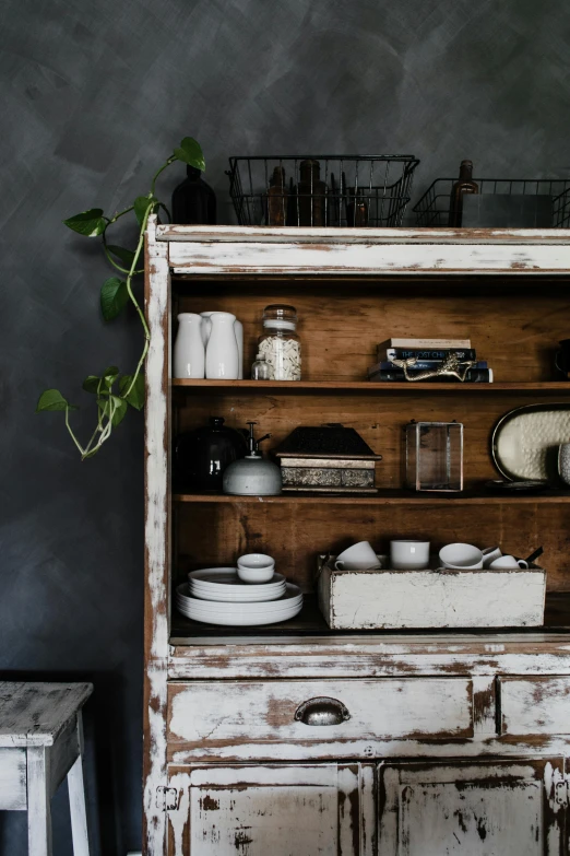 a cabinet with a bunch of dishes on top of it, a still life, unsplash, distressed, attractive photo, cottage, 15081959 21121991 01012000 4k