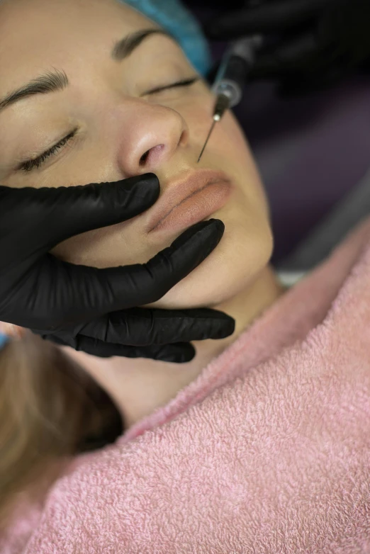 a woman getting her eyebrows done at a beauty salon, a tattoo, by Sam Black, instagram, large full lips, profile image, square nose, anaesthetic