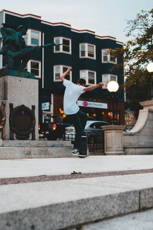 a man flying through the air while riding a skateboard, a statue, unsplash contest winner, rhode island, street corner, video footage, square