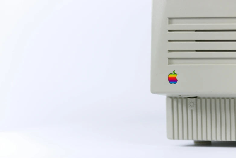 an apple computer sitting on top of a desk, by Adam Rex, super nintendo cartridge, 4k vertical wallpaper, fan favorite, 4 k detail