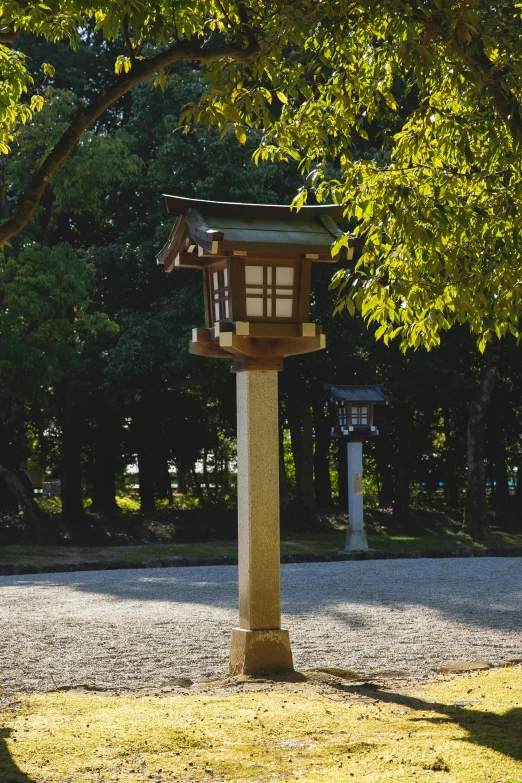 a red fire hydrant sitting in the middle of a park, inspired by Tōshi Yoshida, sōsaku hanga, hanging lanterns, pedestal, evening sun, rectangle