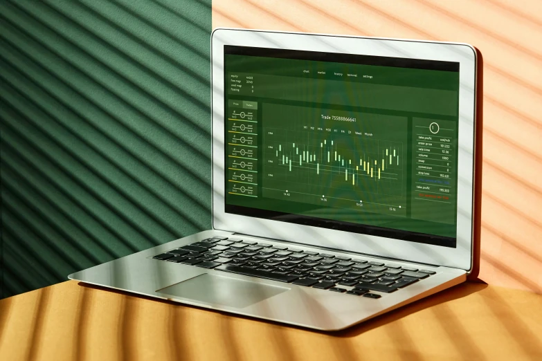 a laptop computer sitting on top of a wooden table, a computer rendering, by Emma Andijewska, trending on unsplash, analytical art, green and gold, waveforms on top of square chart, pine color scheme, car trading game