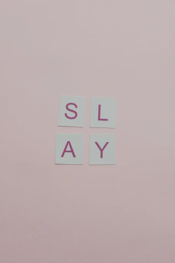 a laptop computer sitting on top of a desk, an album cover, by Peter Alexander Hay, unsplash, slay, pink clothes, board game, lettering