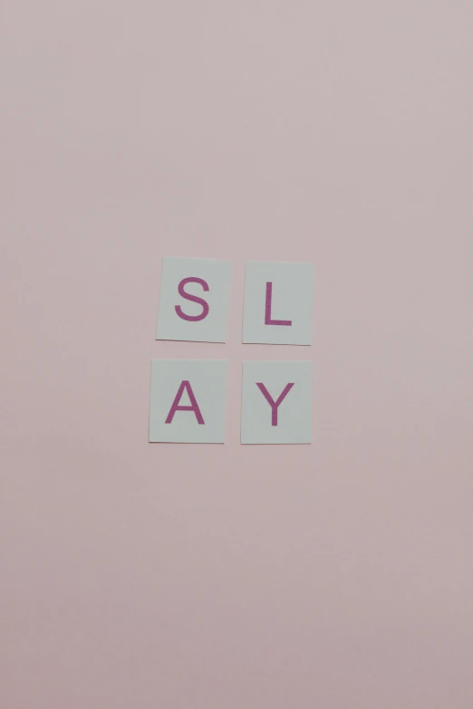 a laptop computer sitting on top of a desk, an album cover, by Peter Alexander Hay, unsplash, slay, pink clothes, board game, lettering