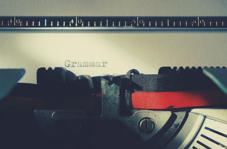 a close up of an old typewriter, a picture, unsplash, art & language, gradient red to black, ignant, linear gamma, giving a speech