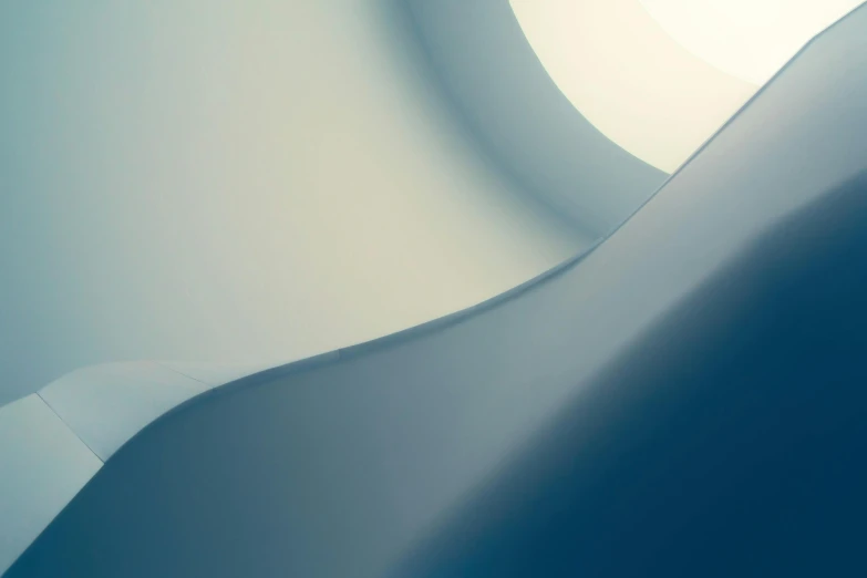 a man riding a skateboard up the side of a ramp, an abstract sculpture, unsplash contest winner, light and space, gradient white blue green, graceful curves, soft light - n 9, computer wallpaper