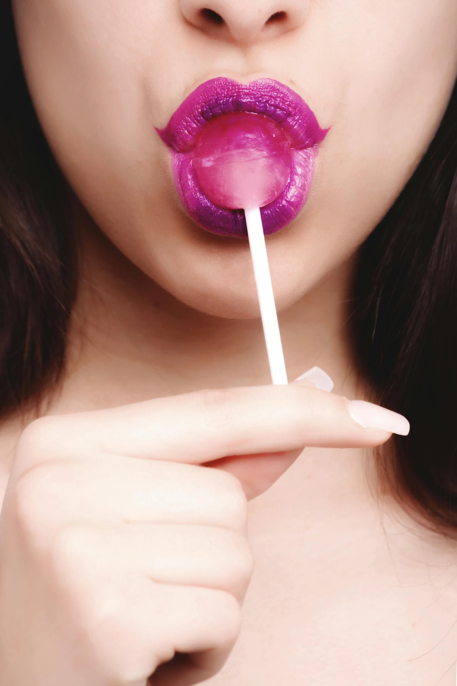 a close up of a person holding a lollipop, inspired by Bert Stern, sexy lips, 奈良美智, ((purple)), candy treatments