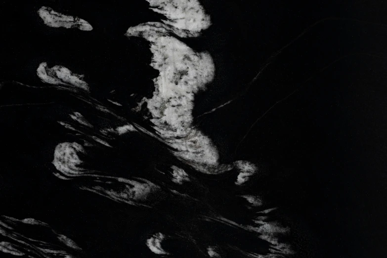 a black and white photo of a body of water, an album cover, inspired by Arkhip Kuindzhi, unsplash, lyrical abstraction, marbled, satellite photo, dark aesthetic, marble!! (eos 5ds r