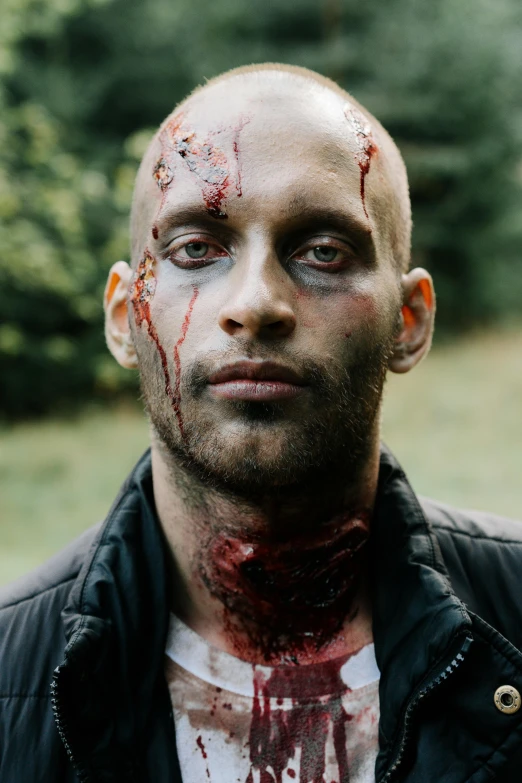 a man with blood all over his face, an album cover, pexels contest winner, renaissance, beautiful zombie, shaved face, izombie, movie still of a tired