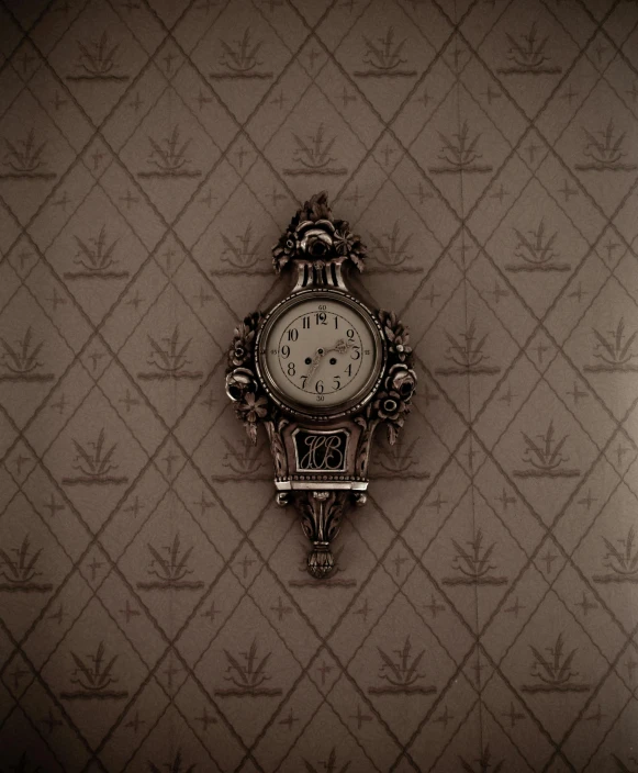 a clock mounted to the side of a wall, an album cover, by Elsa Bleda, rococo, dark wallpaper, sepia photography, faberge, miniature product photo